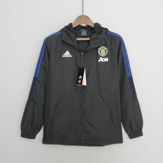 Corta - vento Manchester United 21/22 Adidas - Preto e Azul - DA Sports Oficial